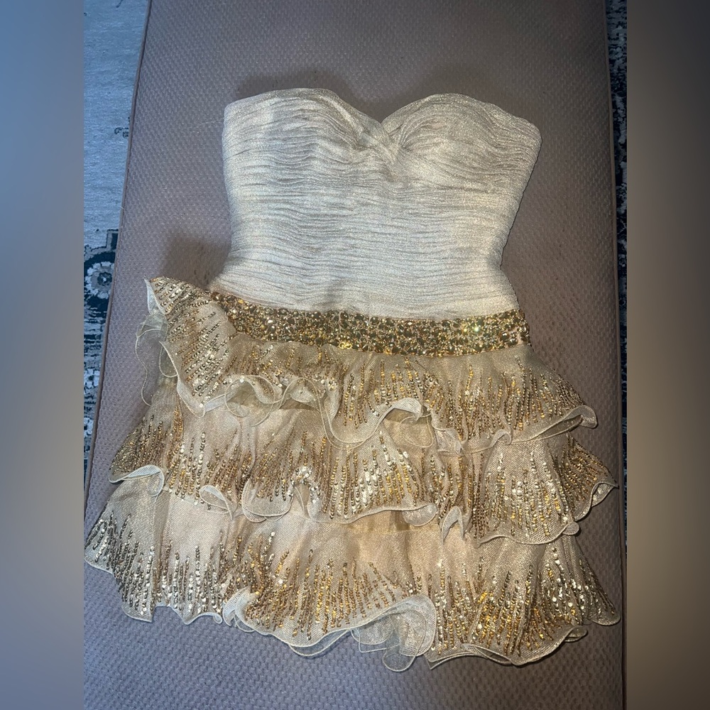 Gold strapless homecoming/prom dress